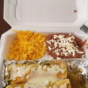 Chicken enchiladas. Dry and not much enchilada sauce. Beans were really good.