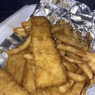 Fish and Chips that you can buy in any frozen food section of the grocery store, processed fish patty.