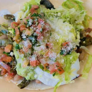 Vegetarian taco w/ cactus- so fresh, delicious and big.  FYI order 1 if you're going to order food.