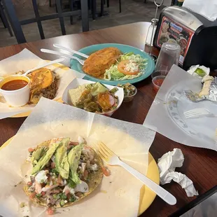 Birria taco, burrito, Chile-Relleno, Tostada de Camaron and Pulpo.