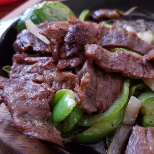 beef and peppers in a skillet