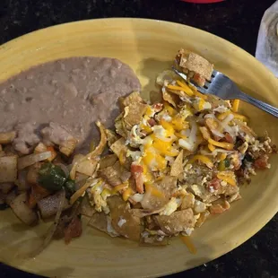 Migas mexican potatoes with refried beans