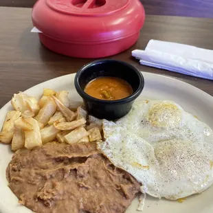 Huecos rancheros sauce on side, 2 flour tortillas