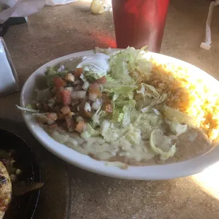 Beans,Pico, rice and sour cream that come with Fajitas