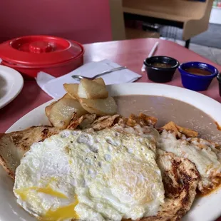 Look at that yolk! Chilaquiles with chicken!