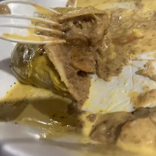 I ordered a shrimp burrito with lettuce, tomato, sour cream, and everything. They gave me a burrito with refried beans that's it.