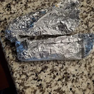two foil packets on a counter