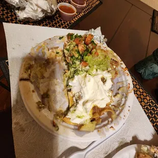 Order two burritos with maybe a spoonful of meat and all rice and beans, And nachos that had very limited meat.