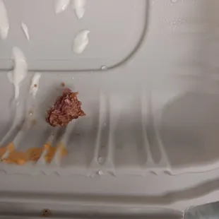 Raw ground beef on the Nachos