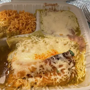 Chicken enchilada (green sauce) and tamale of the day (pork) combo
