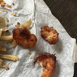 The burnt, overcooked, rubbery shrimp in the surf n turf (only 3-4 shrimp in the entire burrito worth $16)