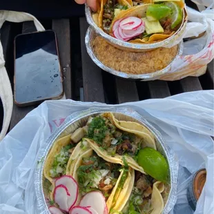 two plates of tacos
