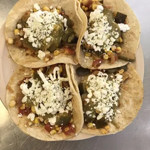 Vegetales tacos de w/ zucchini.corn. Dice tomatoes white onion. Dice jalapeño finish fresh cheese sour. Cream
