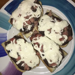 Breakfast special Molletes { Bread, Beans, Ham and Oaxaca cheese } $ 5.00