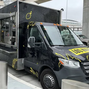 a food truck parked in a parking lot