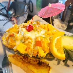 The pineapple dish was amazing. It had a Chipotle cream sauce, shrimp, scallop, and pineapple. It&apos;s definitely a must.