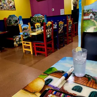 a restaurant with tables and chairs