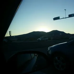 Pretty sunset over LL hill minus the cars driving