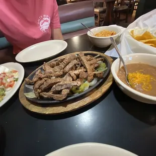 a table full of mexican food