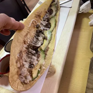 Machete azteca, steak, beans, avocado and of course a lot of Oaxaca cheese