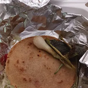 A Chile Rellenos taco and an Al Pastor gordita