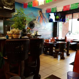 Dining area. The decorative chairs and tables are very TexMex.