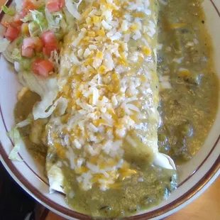 Green Chile con carne smothered burrito at Los Mariachi's on Bataan. Very good.