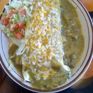 Los Mariachi's green chile con carne smothered burrito. Fairly high on the heat. Very good but not among the best in town.