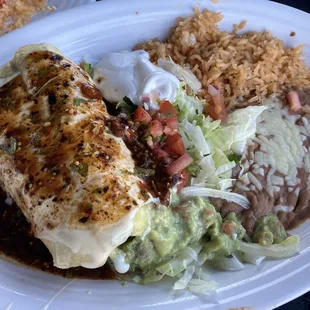 Toreko Chimichanga with rice, refried beans and sour cream