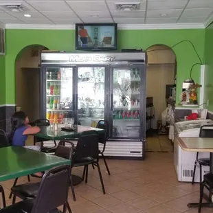 Inside view from front door. The right archway is where you pick up to-go from.