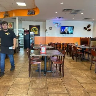 a man standing in a restaurant