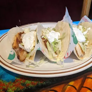 three tacos on a plate