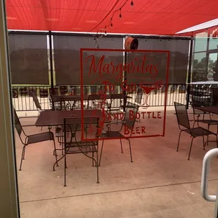 Shaded outdoor dining patio.