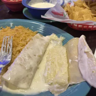2 cheese enchiladas with cheese NOT melted inside..