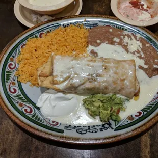 Steak Chimichanga. Comes with rice and beans plus guacamole and sour cream