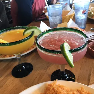Blended mango margarita and raspberry on the rocks