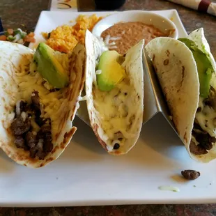 Steak Tacos del Rio with a side of beans and rice