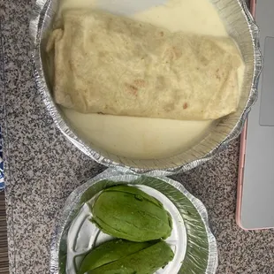 This is what a flimsy egg, bean and cheese burrito looks like. The avocado is not even in the burrito. AN EMBARRASSMENT. Not AUTHENTIC. lol