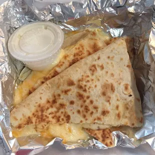 two quesadillas in foil