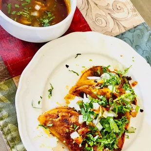 Our Birria Red Tacos are delicious! Place an order and we will deliver them to you.
