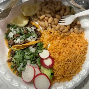 Two asada tacos w rice and beans
