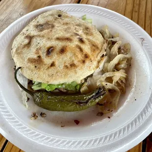  tortilla sandwich on a paper plate