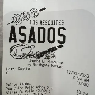 a hand holding a receipt