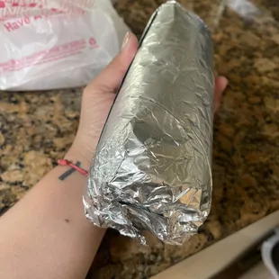 My $12 chicken burrito! This thing was fat and heavy!
