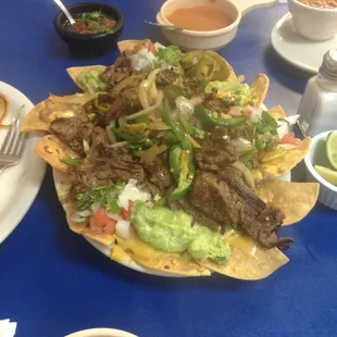 If you like spicy food try the botana with Fajitas Toreadas. I guarantee that you will be pleased.  It's a great place to eat.