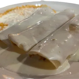 The chicken enchiladas and rice.