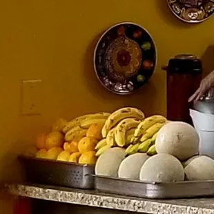 Piles of fresh fruit waiting to be freshly juiced.