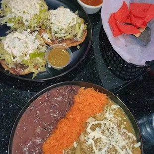 Verde chicken Enchiladas, chips and salsa, nopal and mushroom sopes