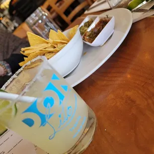 Chips salsa and a drink