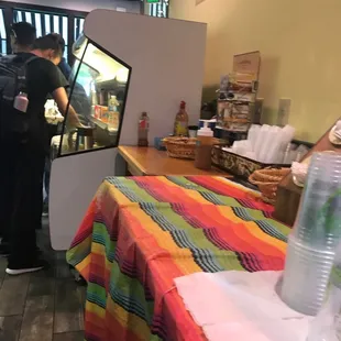 a man ordering food at a restaurant